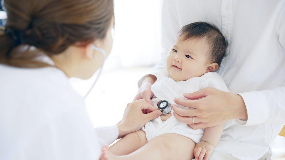Baby with doctor